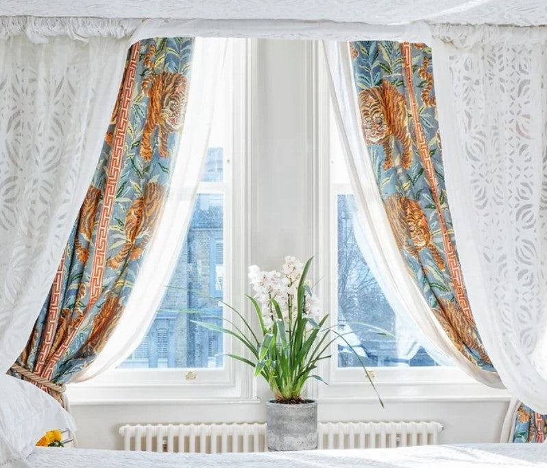 Jim Thompson Tiger fabric for curtains with cut work bed curtains in the foreground