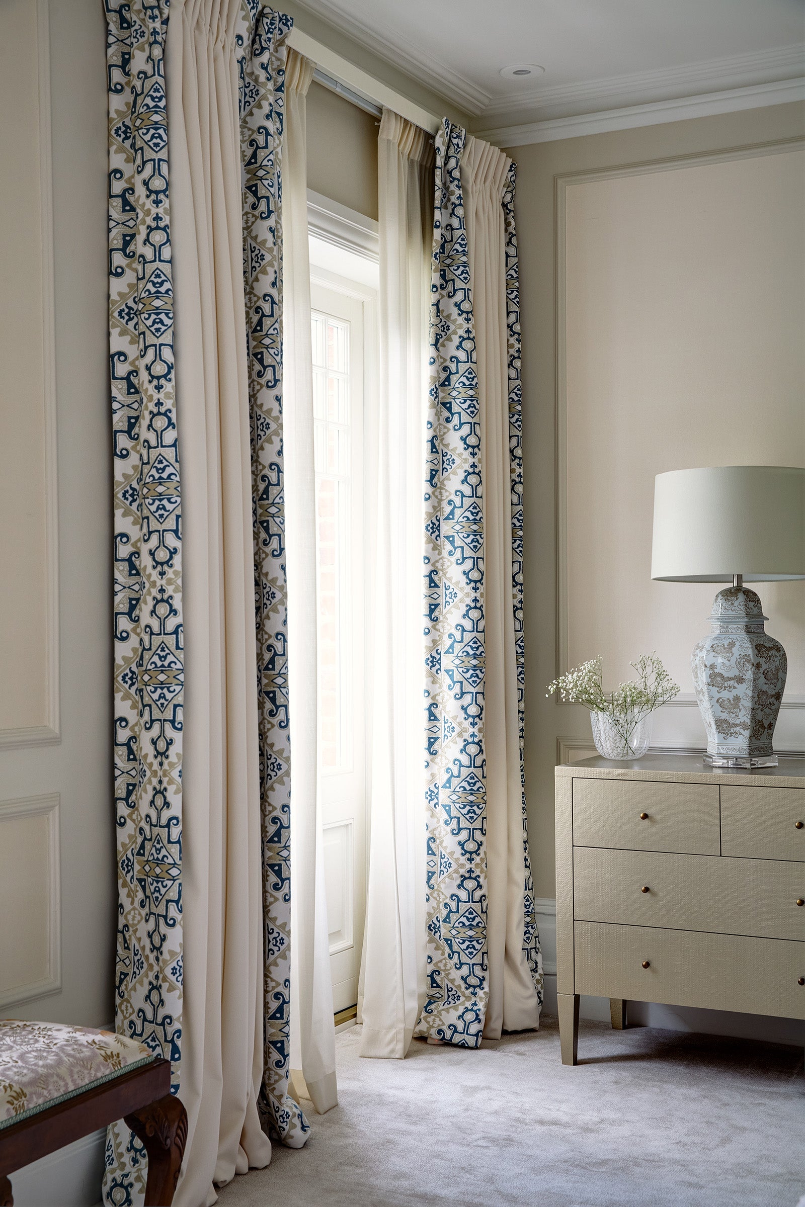 Layered Holland and Sherry wool fabric used for bedroom curtains with Fabricut border and sheer curtains beneath, on Lathe and Fascia