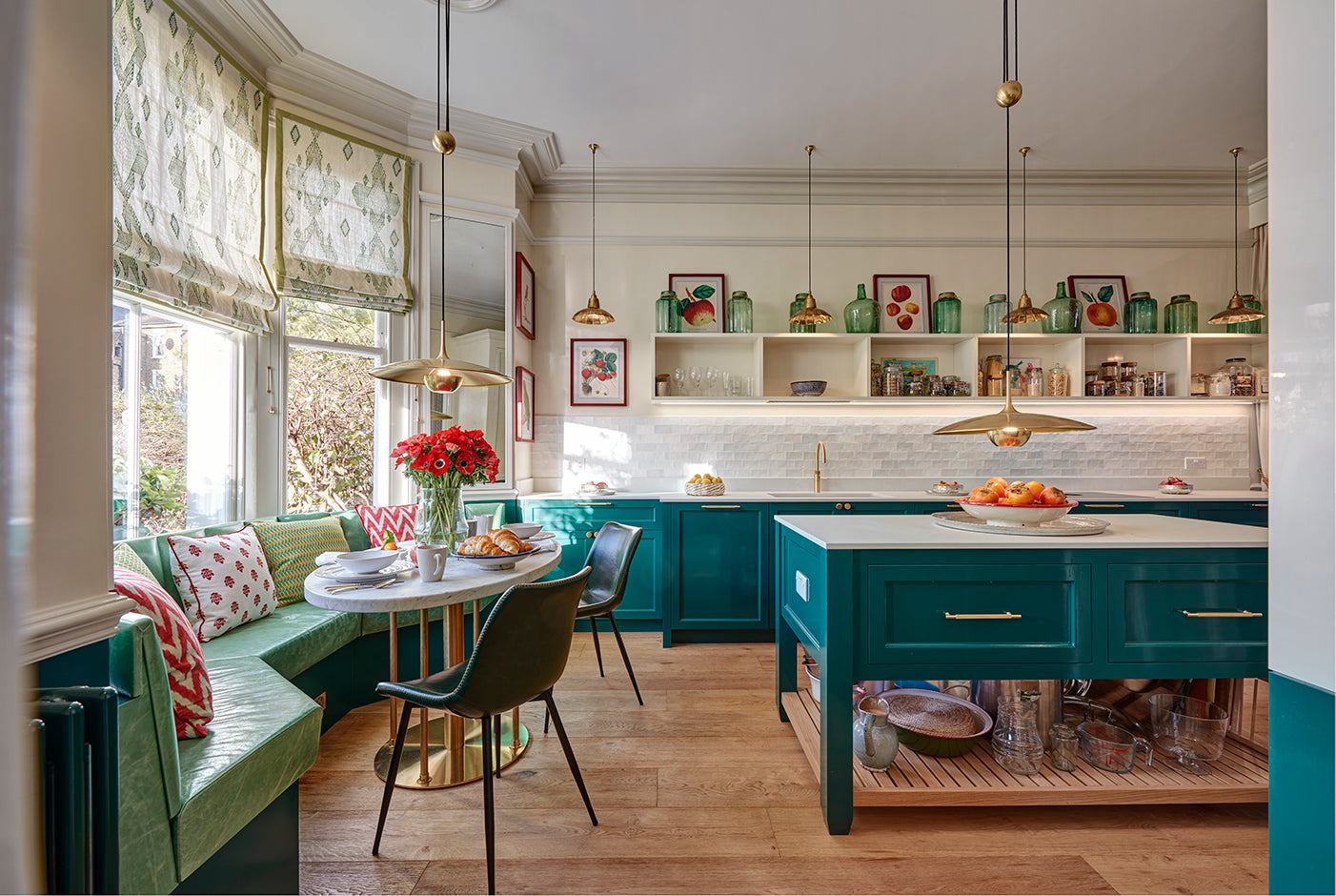 Kitchen design with Roman blinds in a bay window