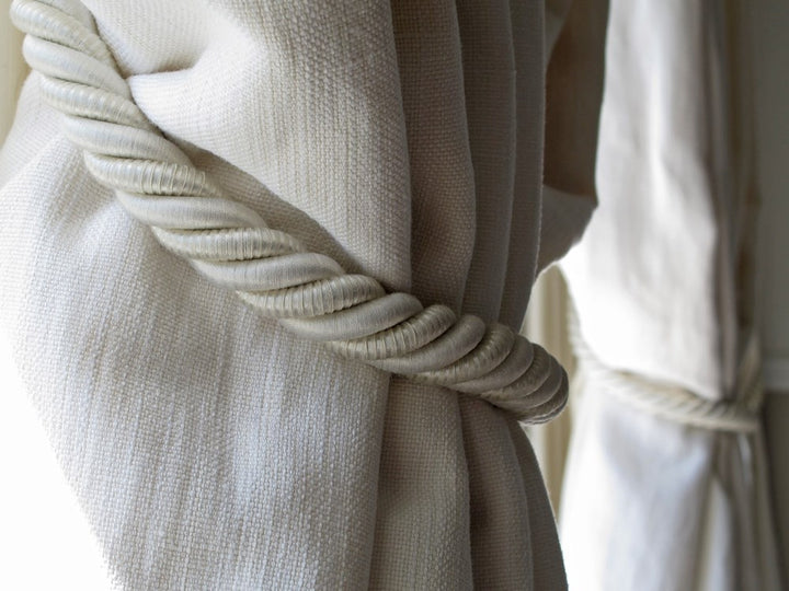 Simple white curtain tieback from French company Passmenterie ile de France