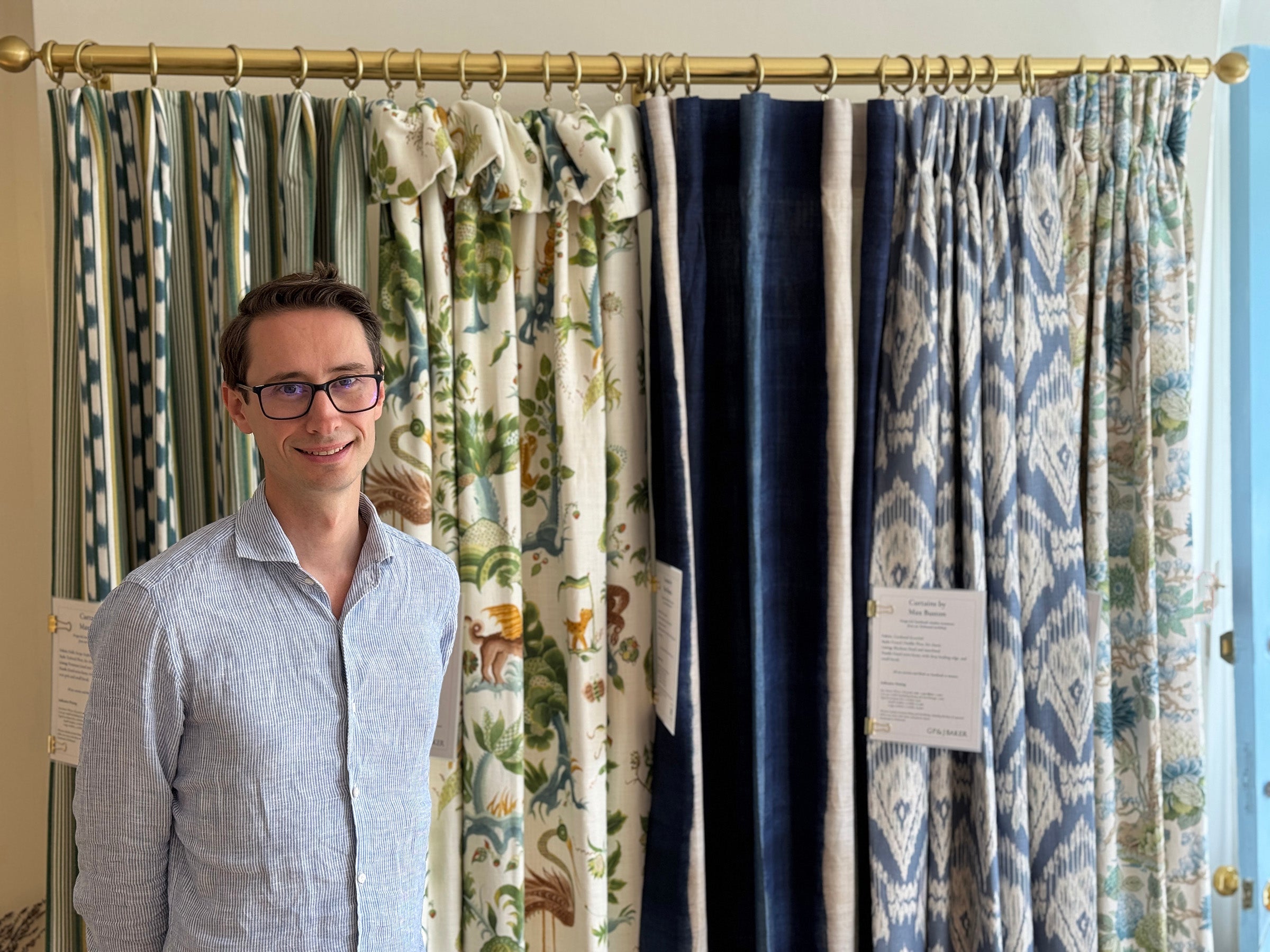 Max Buston and the curtain style and heading wall in the Dartmouth showroom