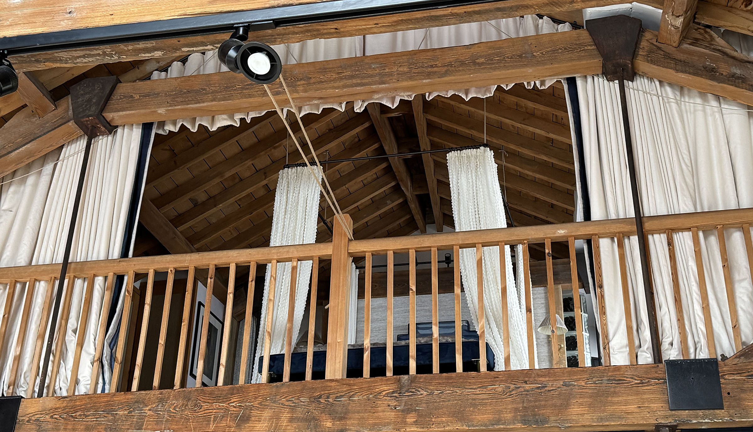 Tented curtain scheme in complex mezzanine level